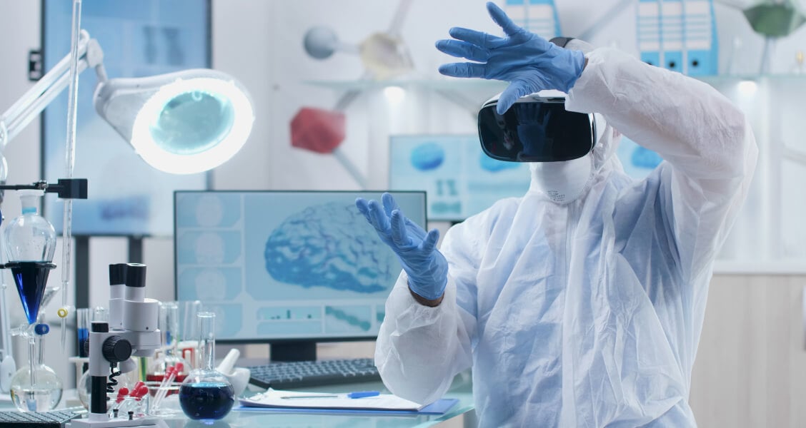 Life sciences researcher working with technology